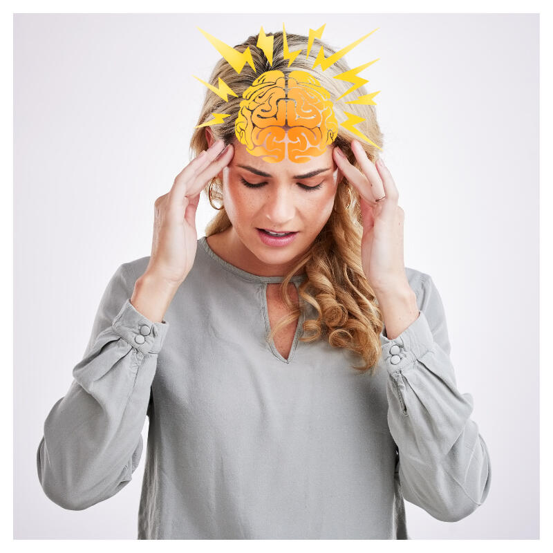 A woman rubbing her head - best supplement for brain fog and mental fatigue